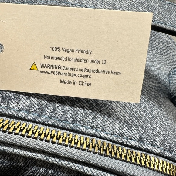 Vegan Quilted Denim Backpack – Gold Chain Accent | 100% Vegan-Friendly

⸻
